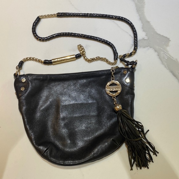 Black leather purse with tassel and gold detail - Picture 1 of 9